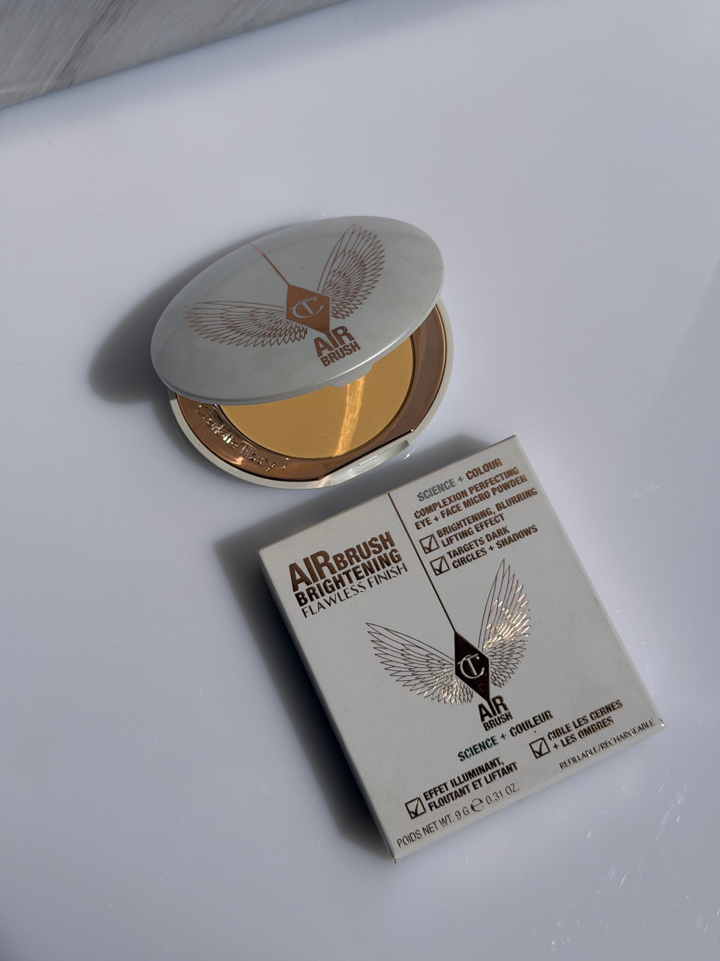 Charlotte Tilbury Refillable Airbrush Flawless Finish Brightening Powder- TAN /DEEP