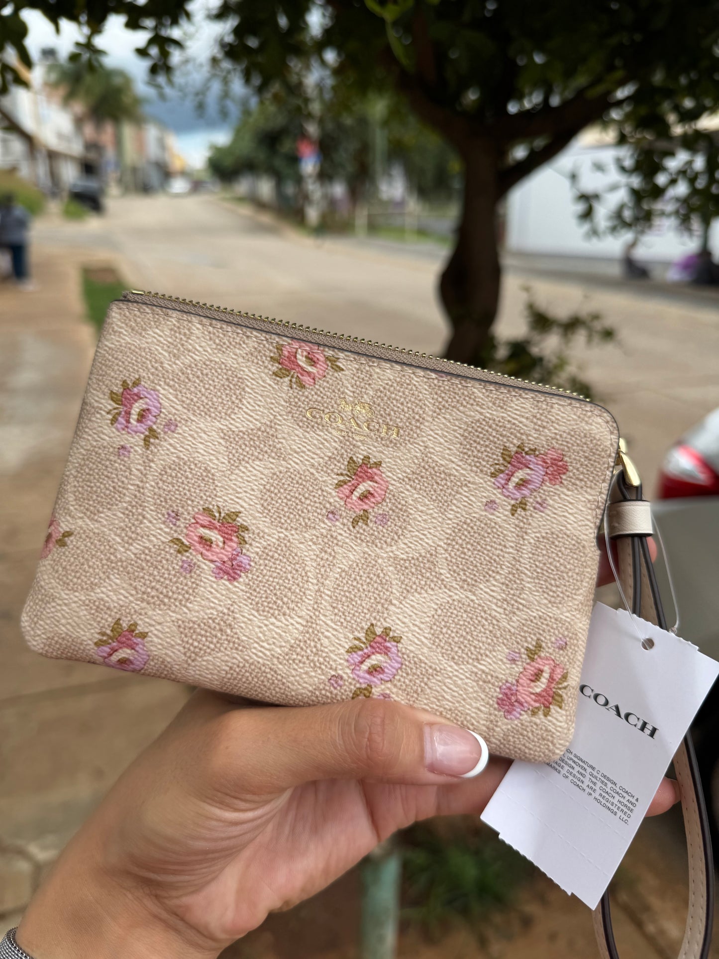 Muñequera Coach de Flores chica de un cierre