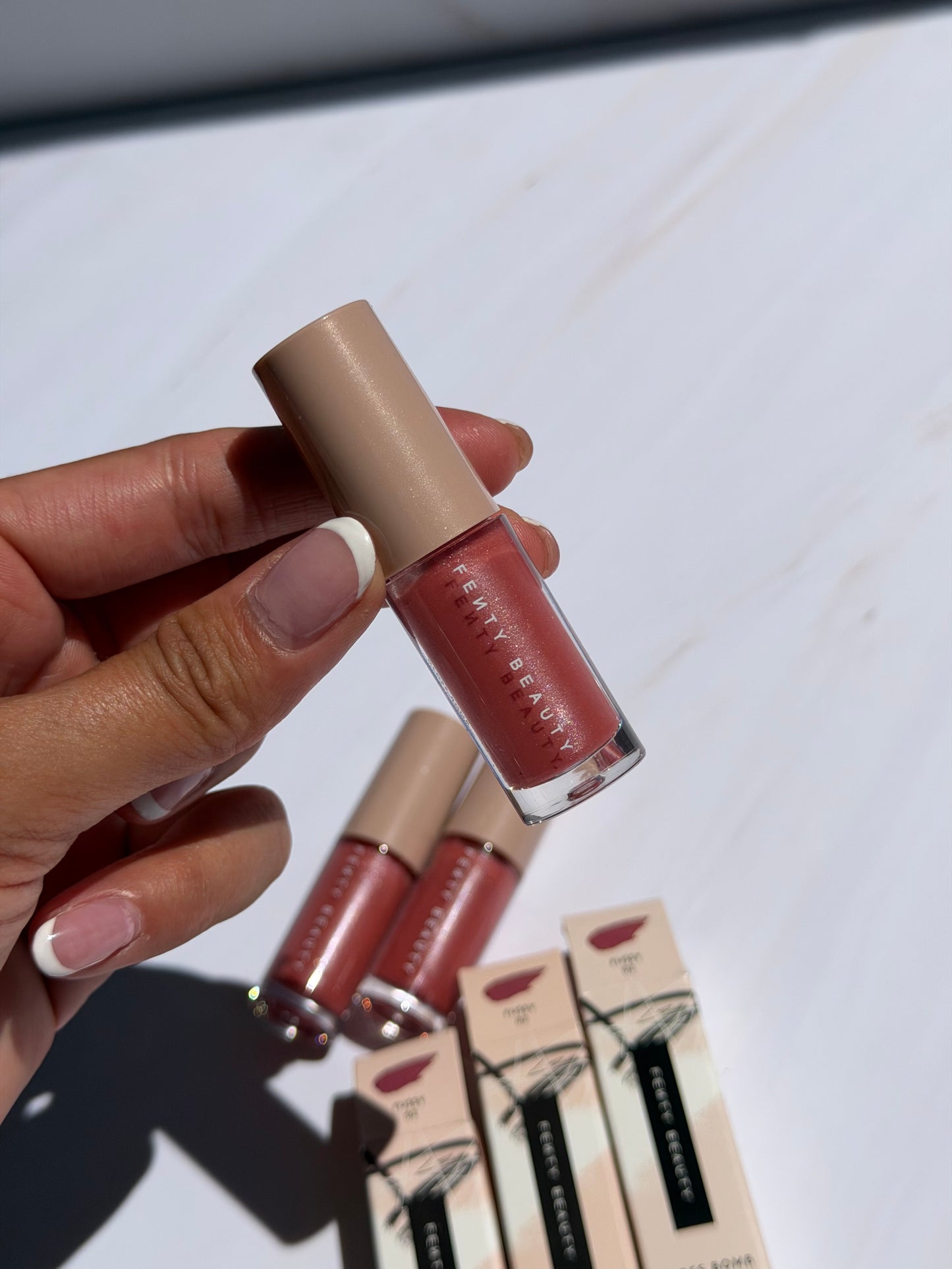 Fenty Beauty by Rihanna- MINI Gloss Bomb Universal Lip Gloss Luminizer- TOÑO FU$$Y