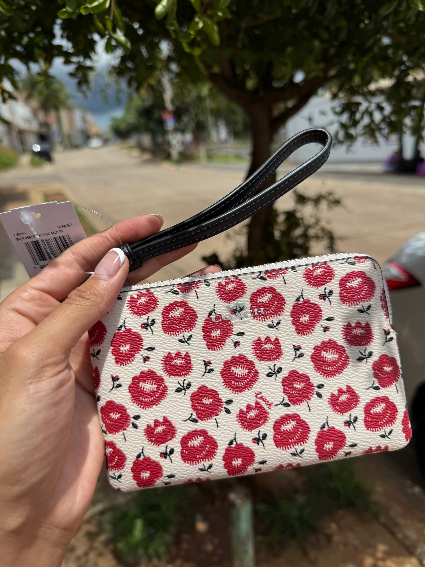 Muñequera Coach de Flores Rojas chica de un cierre