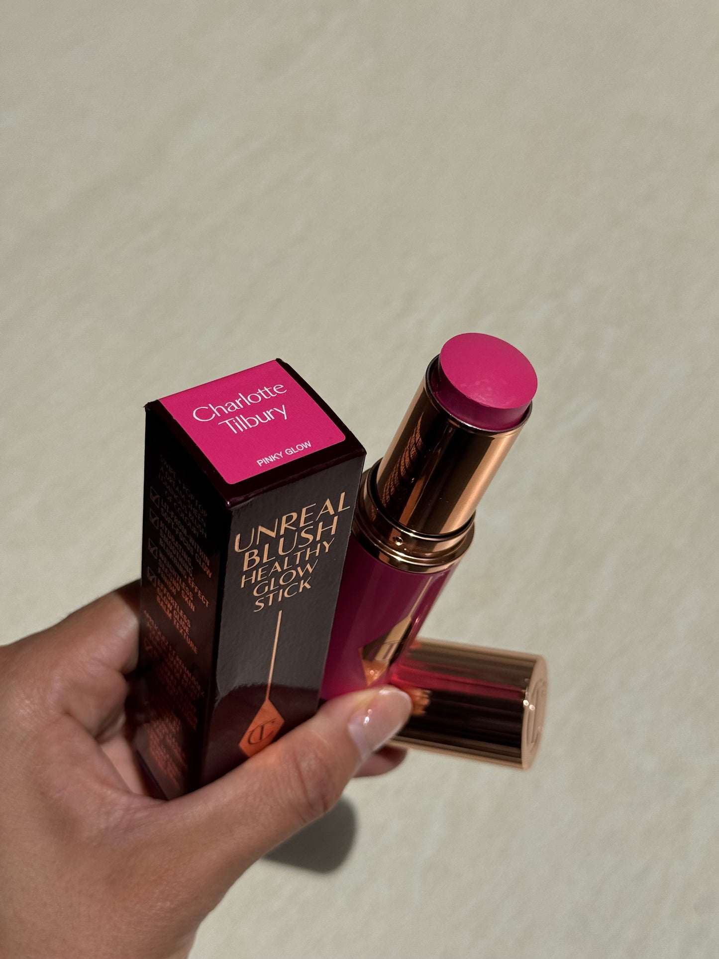 Charlotte Tilbury Unreal Lip + Cheek Glow Blush Stick with Hyaluronic- PINK GLOW