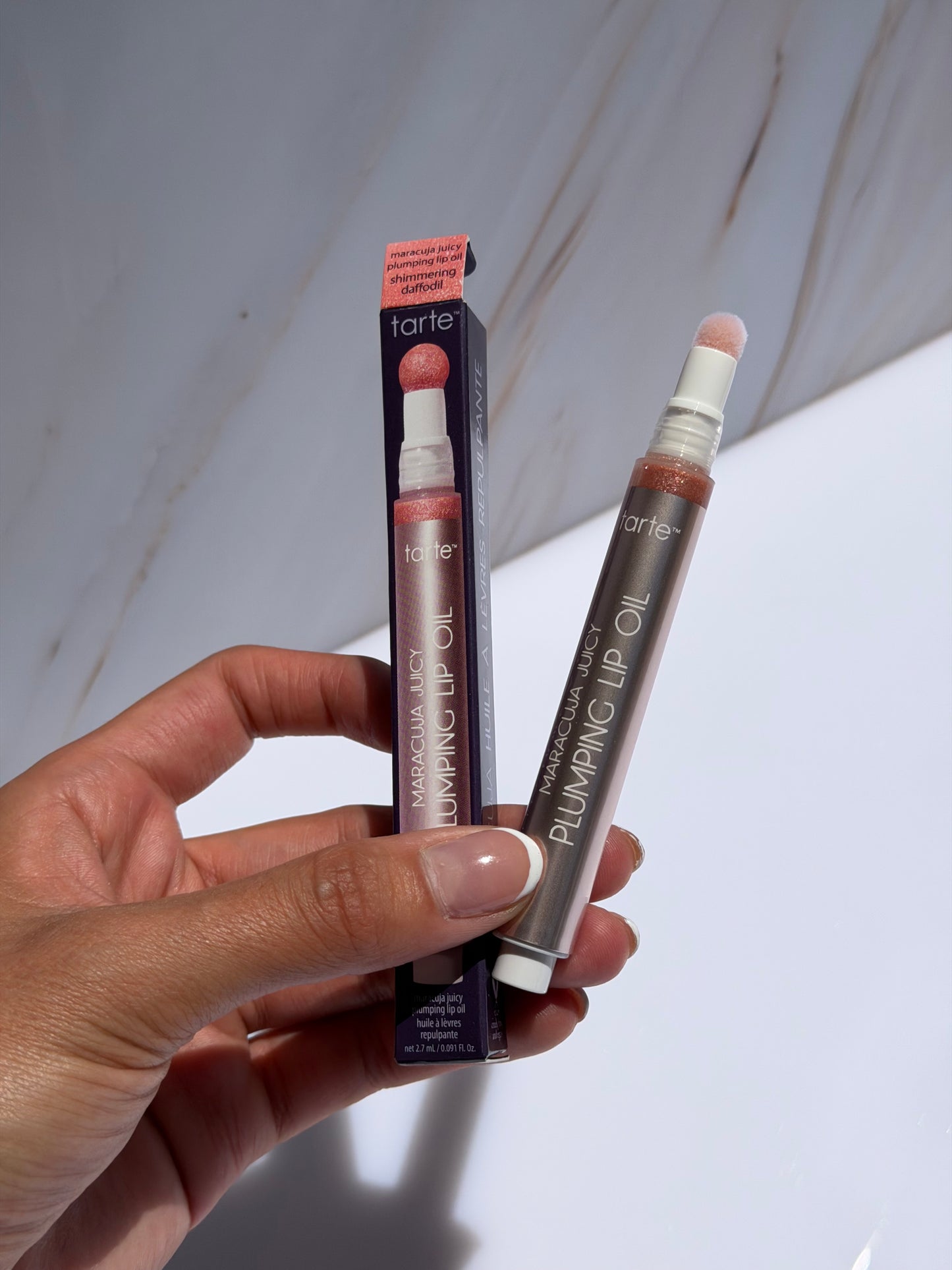 Maracuja juicy plumping lip oil- Tarte tono Shimmering Daffodil
