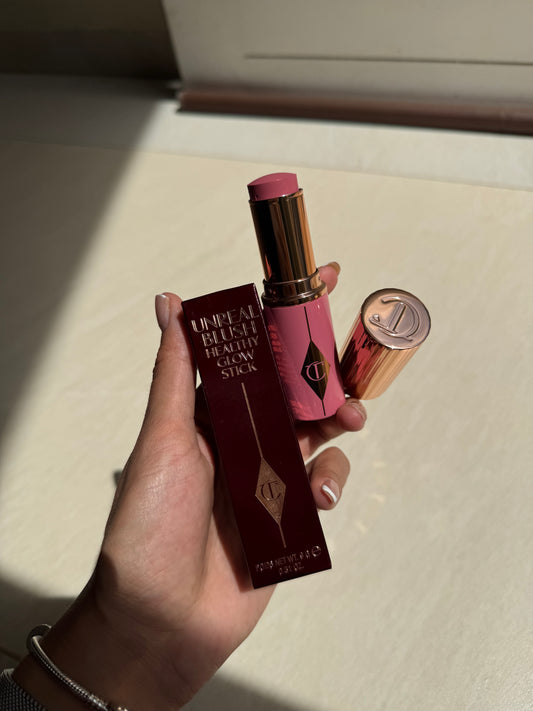 Charlotte Tilbury Unreal Lip + Cheek Glow Blush Stick with Hyaluronic- ROSY GLOW