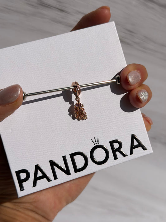 Charm colgante pluma con piedras lilas en oro rosado PANDORA ESPAÑA