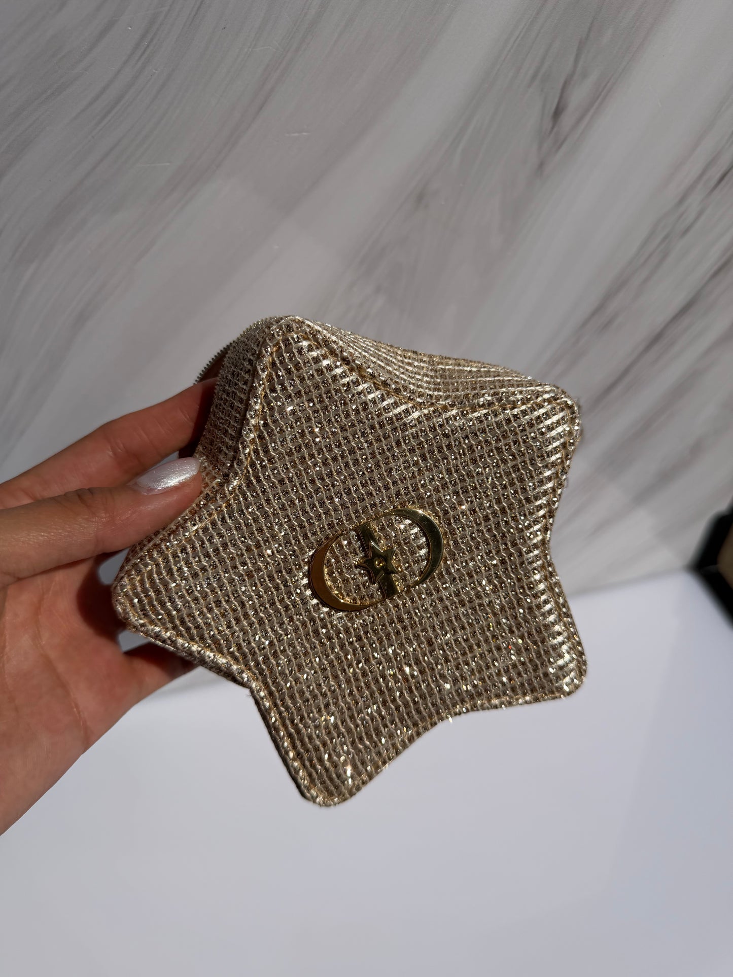 Cosmetiquera DIOR en Estrella Dorada