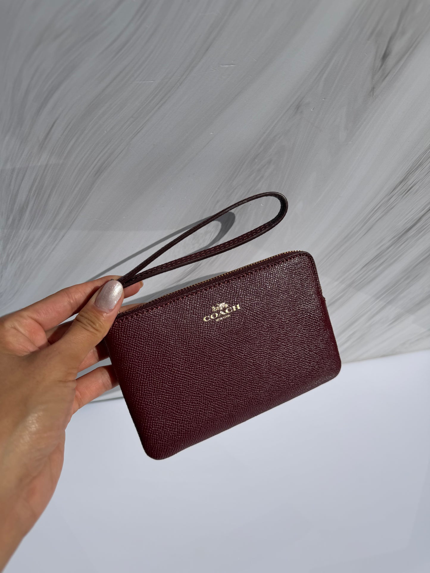 Muñequera Coach Sencilla- Vino
