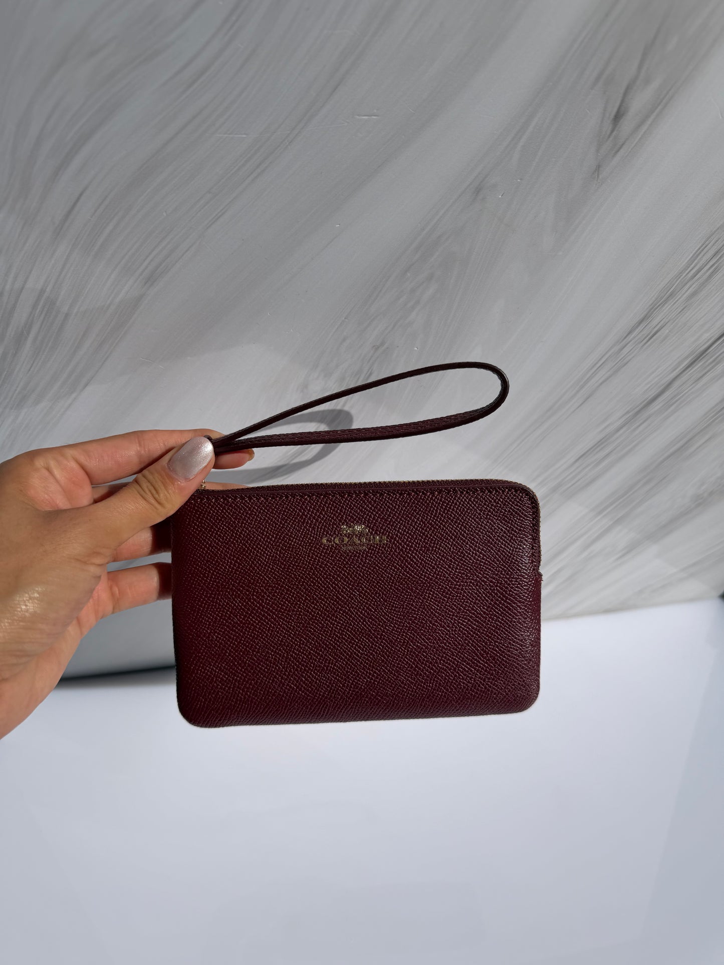 Muñequera Coach Sencilla- Vino