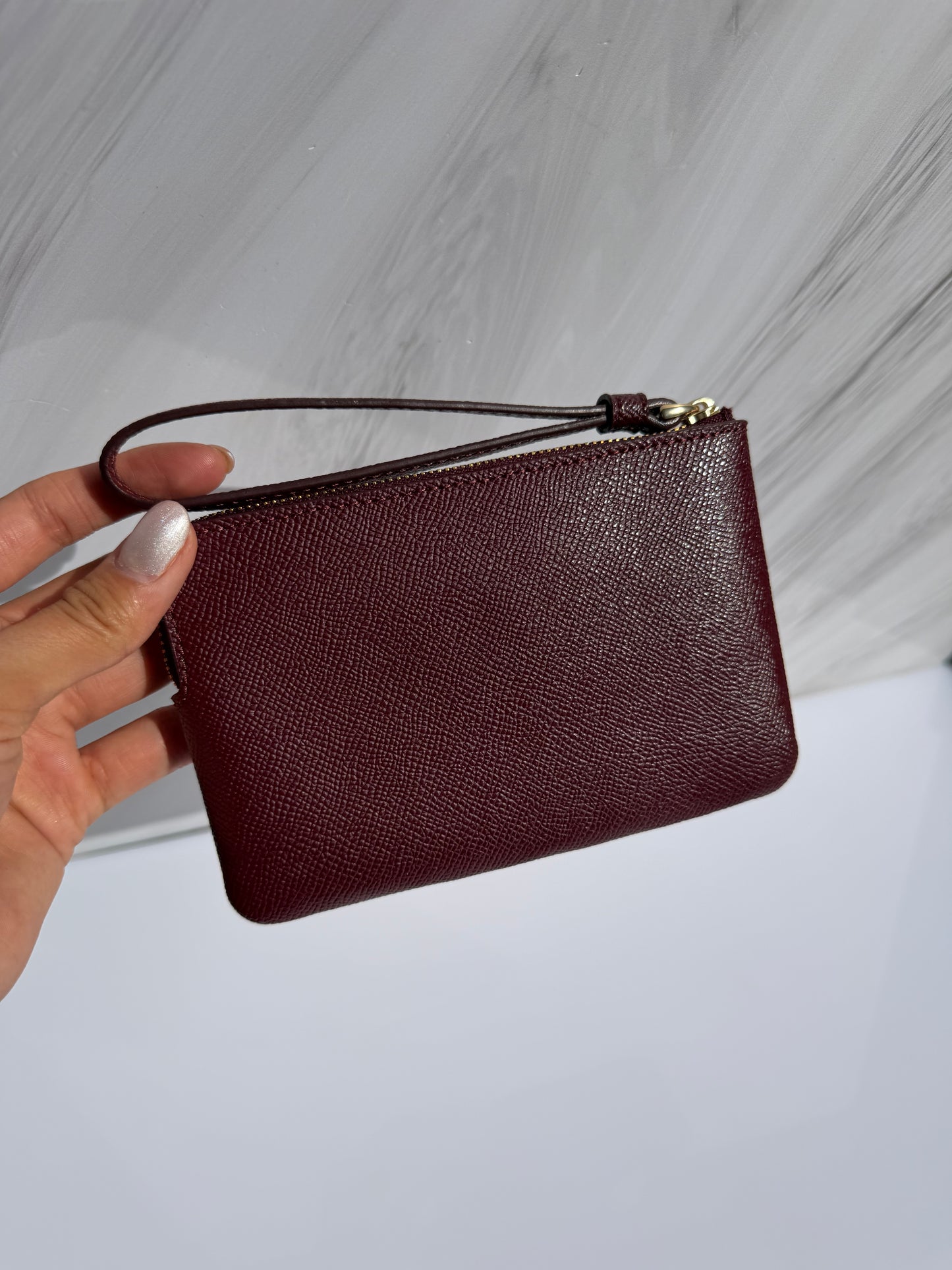 Muñequera Coach Sencilla- Vino