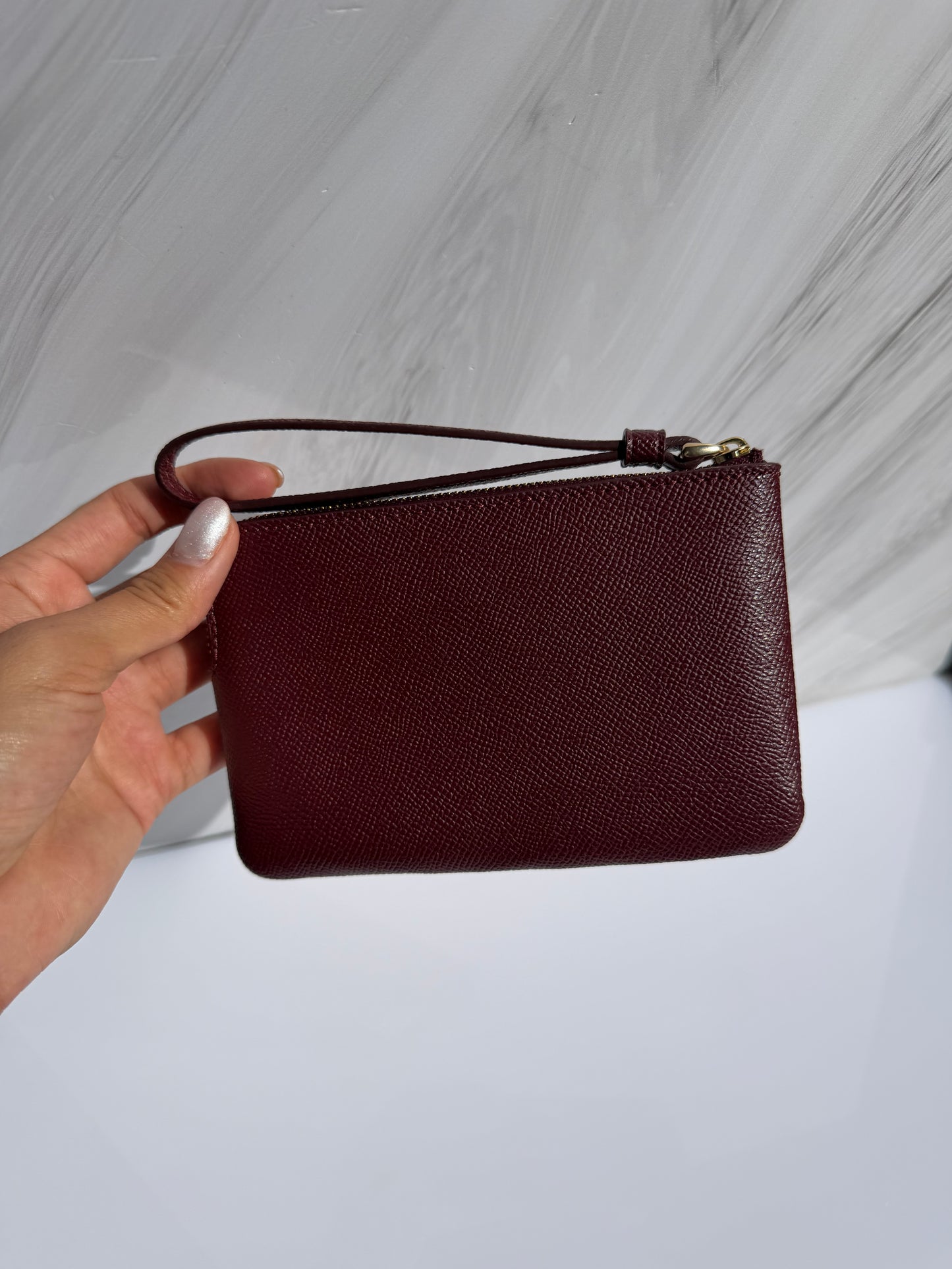 Muñequera Coach Sencilla- Vino
